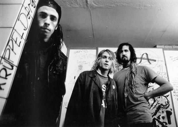 Left to right, Dave Grohl, Kurt Cobain and Krist Novoselic of Nirvana pictured in 1991, during the release of Smells Like Teen Spirit.  Photo by Paul Bergen/Redferns