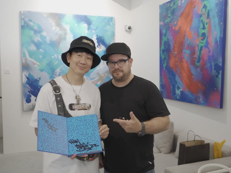 Singaporean singer-songwriter JJ Lin with Stash during the exhibition in Singapore.